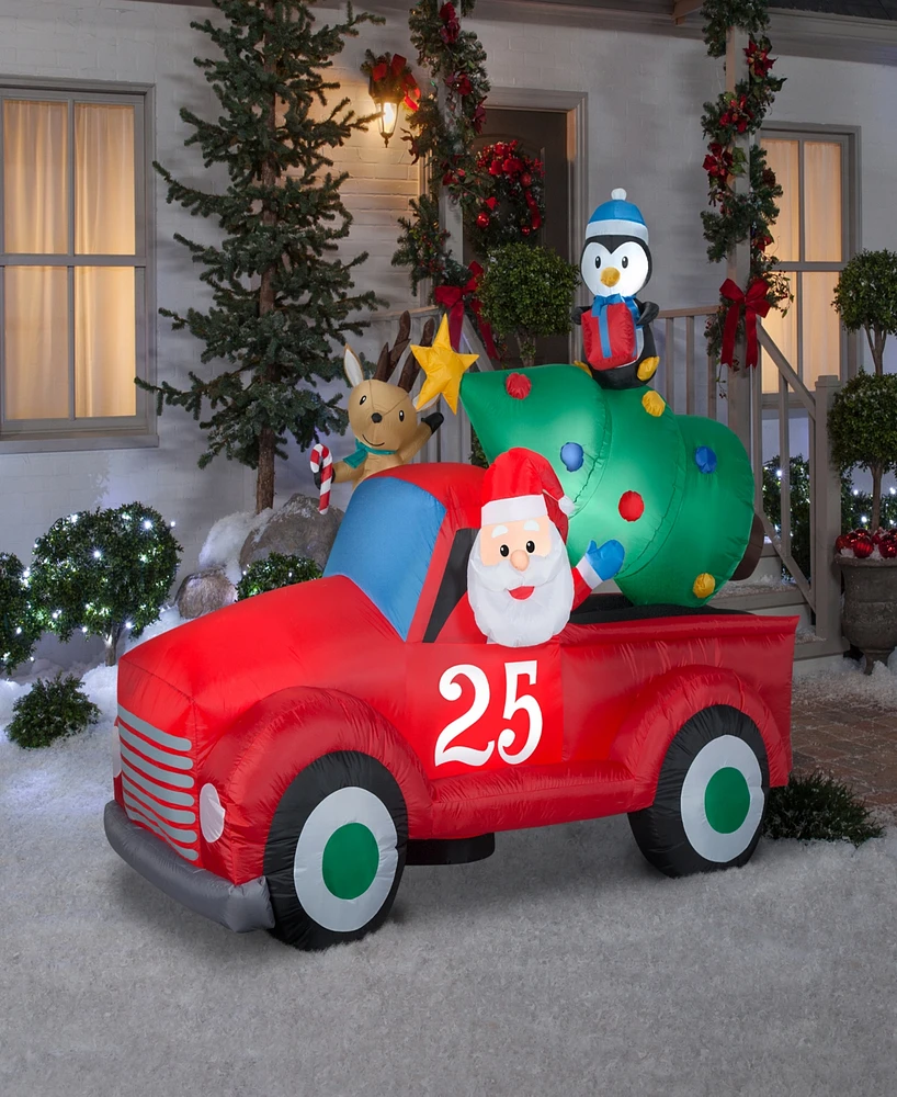 National Tree Company 6 ft. Inflatable Santa in Pickup Truck