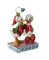 Jim Shore Disney Traditions Donald and Daisy Mistletoe Figurine