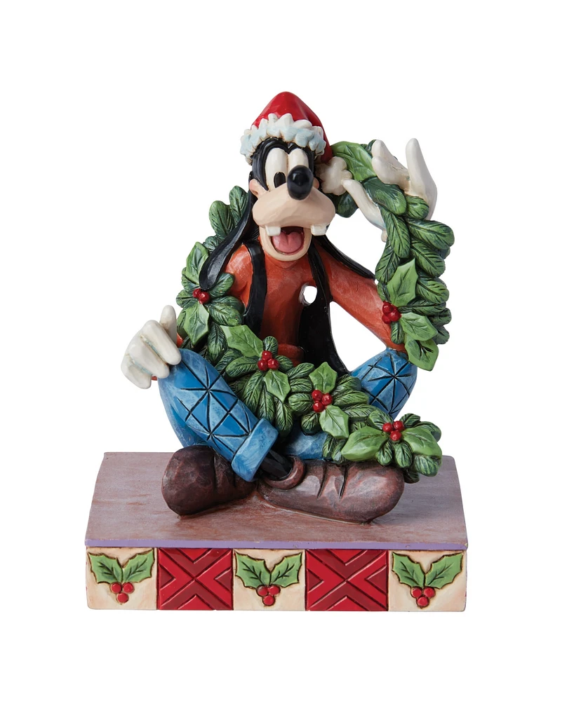 Jim Shore Disney Traditions Goofy with Christmas Garland Figurine