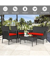 Sugift 4 Pieces Patio Rattan Cushioned Sofa Set with Tempered Glass Coffee Table-Red