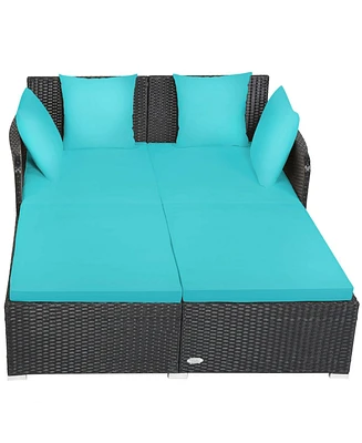 Skonyon Spacious Outdoor Rattan Daybed with Upholstered Cushions and Pillows