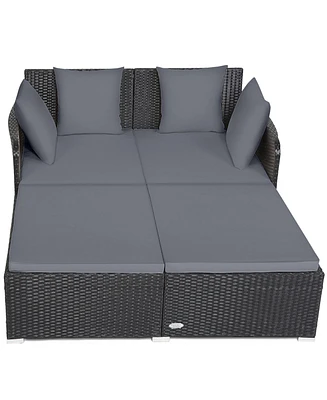 Skonyon Spacious Outdoor Rattan Daybed with Upholstered Cushions and Pillows