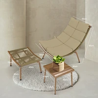 Elegant Chaise Lounge with Table for Indoor/Outdoor Relaxation