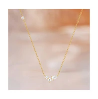 Hollywood Sensation 18K Gold Plated Sterling Silver Necklace with Three Round and One Pear Cut Cubic Zirconia Stones