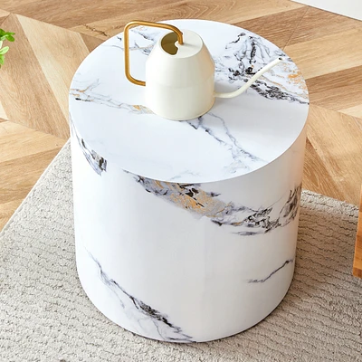 The cylindrical table with its patterned design can be easily integrated into a variety of interior styles, from coffee tables to small dining tables