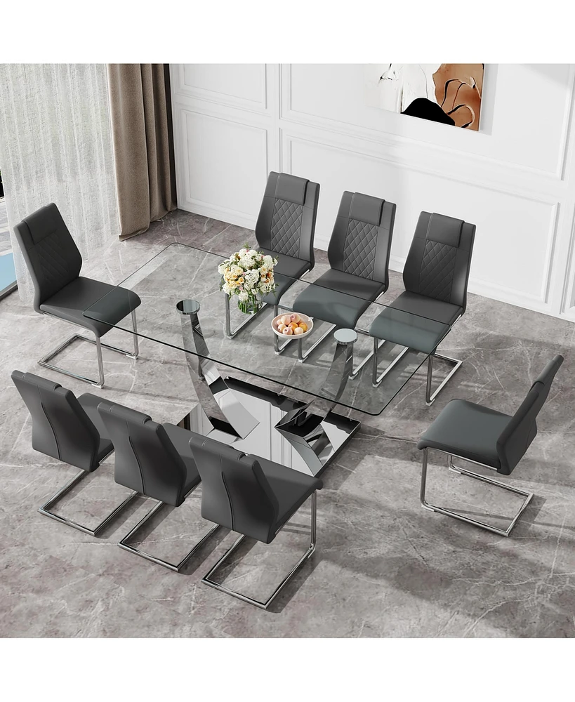 Simplie Fun Table and chair set.Contemporary, minimalist rectangular dining table featuring a clear tempered glass top and sleek silver legs. Paired w