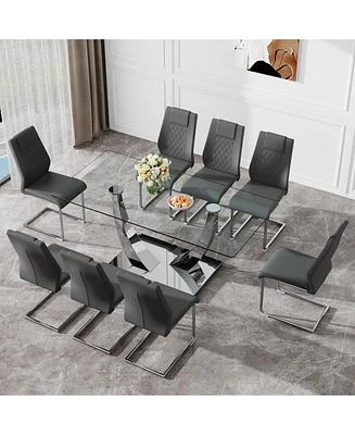 Streamdale Furniture Table and chair set.Contemporary, minimalist rectangular dining table featuring a clear tempered glass top and sleek silver legs.