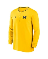 Jordan Men's Maize Michigan Wolverines 2024 Sideline Coach Performance Half-Zip Long Sleeve Top