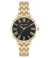 Anne Klein Women's Quartz Round Roman Numeral Gold-Tone Metal Alloy and Black Dial Watch, 32mm