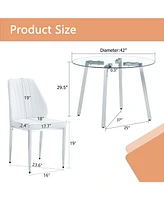 Modern Glass Table and White Pu Dining Chairs