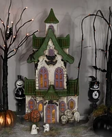 Northlight 22.75" Led Lighted Haunted House with Skulls Halloween Decoration