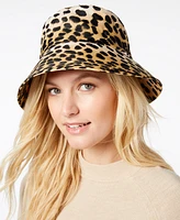 Totes Women's Split-Back Bow Water Repellent Rain Hat