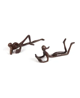 Danya B. Man and Woman Leisurely Reading Bronze Sculptures - Set of 2