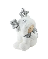 Northlight 12.5" Smiling Child in White Reindeer Snow Suit Christmas Tabletop Decoration