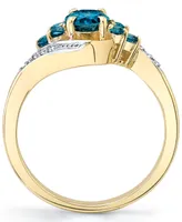 Blue Topaz (1-1/3 ct. t.w.) & Diamond (1/20 ct. t.w.) Swirl Ring in 10k Gold