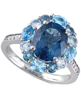 Blue Topaz Oval Halo Statement Ring (5-3/8 ct. t.w.) Sterling Silver