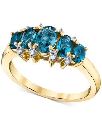 Blue Topaz (1-3/4 ct. t.w.) & Diamond (1/20 ct. t.w.) Graduated Statement Ring in 10k Gold