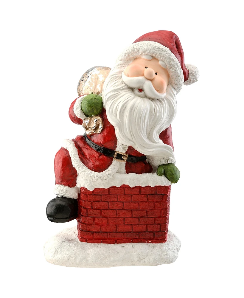 National Tree Company 14" Santa Climbing into Chimney Figurine