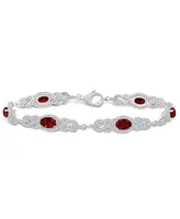 Macy's Garnet (3 1/2 ct. t.w.) and Topaz (2 1/10 ct. t.w.) Bracelet in Sterling Silver