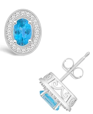 Macy's Blue Topaz (1-1/7 ct. t.w.) and Diamond (1/5 ct. t.w.) Halo Studs in Sterling Silver