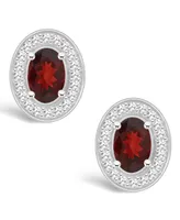 Macy's Garnet (1-1/6 ct. t.w.) and Diamond (1/5 ct. t.w.) Halo Studs in Sterling Silver