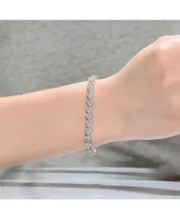 Genevive Sterling Silver with Rhodium Plated Clear Round Cubic Zirconia 3-Stone Triangular Link Bracelet