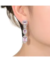 Genevive Sterling Silver with White Gold Plated Pink with Clear Cubic Zirconia Halo Three-Tier Earrings