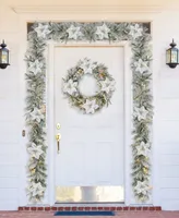 Glitzhome 9' Pre-Lit Snow Flocked Greenery Pine Poinsettia Christmas Garland, with 50 Warm White Lights