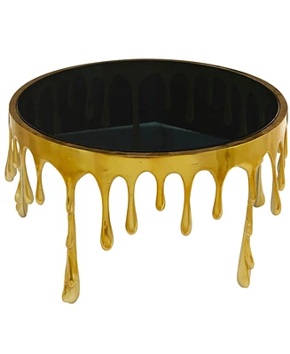 Rosemary Lane Aluminum Drip Coffee Table with Melting Designed Legs and Shaded Glass Top, 36" x 16"