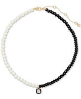 Kate Spade New York Gold-Tone Cubic Zirconia Black & White Beaded Pendant Necklace, 16" + 3" extender