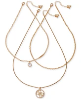 Guess 3-Pc. Gold-Tone Crystal Logo Pendant & Strand Necklace Set