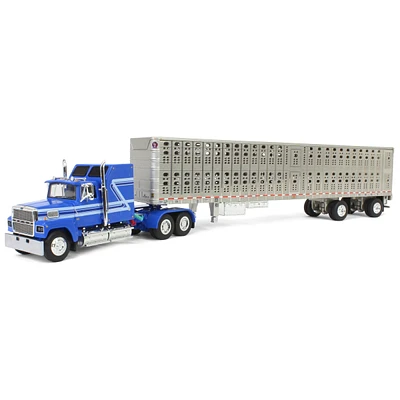 First Gear 1/64 Blue Ford Ltl 9000 60in Aerodyne Sleeper & Wilson Livestock Trailer