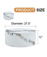 The cylindrical table with its patterned design can be easily integrated into a variety of interior styles, from coffee tables to small dining tables