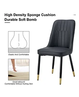 Table and chair set, 1 table with 4 black Pu chairs. White imitation marble pattern desktop. Black Mdf table legs, gold lines, black base.