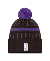 New Era Men's Black Toronto Raptors 2024/25 City Edition Cuffed Knit Hat with Pom