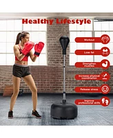 Kuyotq Adjustable Freestanding Punching Bag with Boxing Gloves