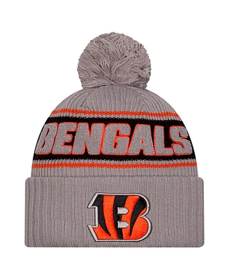 New Era Men's Gray Cincinnati Bengals 2024 Sideline Sport Cuffed with Pom Knit Hat