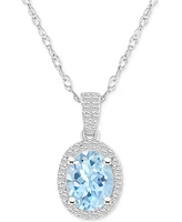 Lab-Created Ruby (1-1/4 ct. t.w.) & White Sapphire (1/6 Oval Halo 18" Pendant Necklace 10k Gold (Also Additional Gem