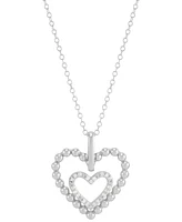 Diamond Double Heart Pendant Necklace (1/10 ct. t.w.) in Sterling Silver, 16" + 2" extender