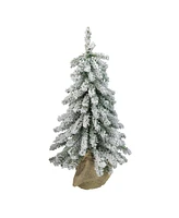 Northlight 15" Flocked Downswept Mini Village Pine Artificial Christmas Tree in Burlap Base - Unlit