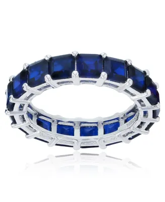 Created Blue Spinel Princess Cut Eternity Band Rhodium Plated Sterling Silver