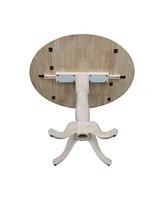 International Concepts 42" Round Dual Drop Leaf Pedestal Table