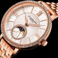 Stuhrling Women's Quartz Sil SIlver Alloy Case, Gold  and Silver Ss Link Bracelet Watch Moonphase  Crystal Studded Bezel White Mother-of-Pearl Dial