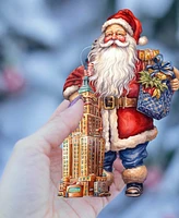 Designocracy Traveling Santa Wooden Ornaments Set of 3 by G.DeBrekht