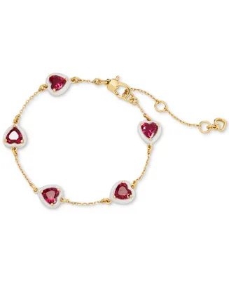 Kate Spade New York Gold-Tone White-Framed Red Crystal Heart Line Bracelet