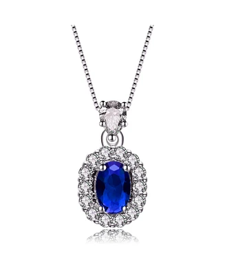 Genevive Sterling Silver White Gold Plated with Blue Oval Cubic Zirconia Accented Clear Pear and Round Cubic Zirconias Necklace