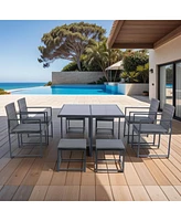 9-Piece Outdoor Dining Set with Space Saving Rattan Chairs