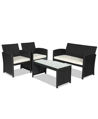 Sugift 4 Pieces Rattan Patio Furniture Set with Weather Resistant Cushions and Tempered Glass Tabletop