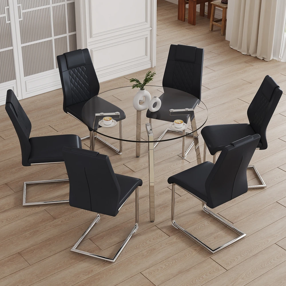 Table and chair set.a Modern Minimalist Style Round Clear Tempered Glass Table with silver Metal Legs.Paired with 6 chairs with Modern Pu Leather High
