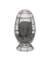 Cozy Swivel Egg Chair: Rattan Haven For Outdoor Relaxation